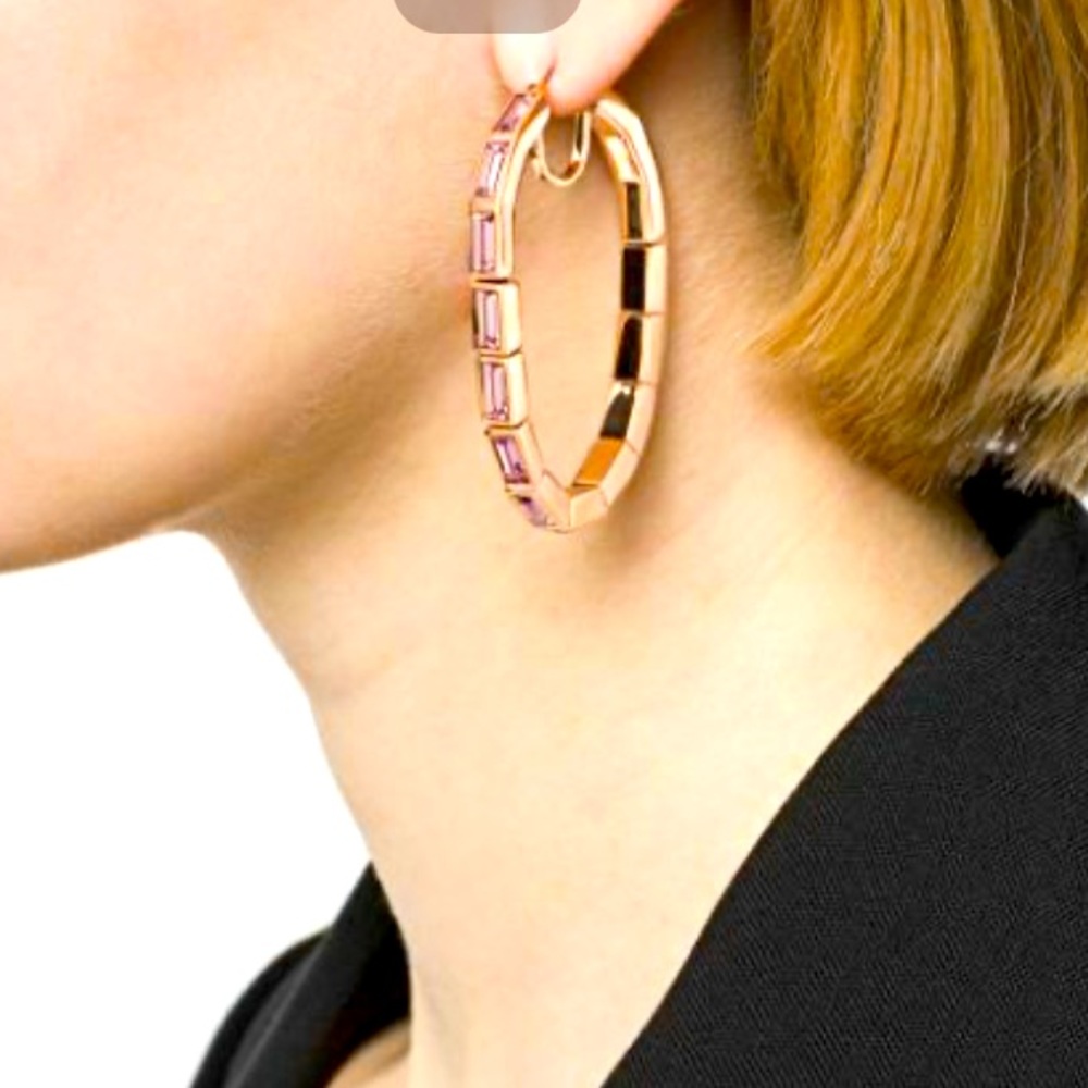 Atelier Swarovski fluid hoops earrings.
